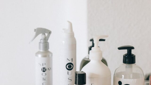 assorted cosmetic products near black bowl