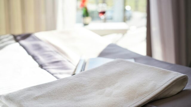 white towel on bed